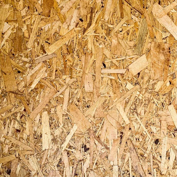 Sıkıştırılmış yonga arka planı. Ahşap zemin. OSB dokusu