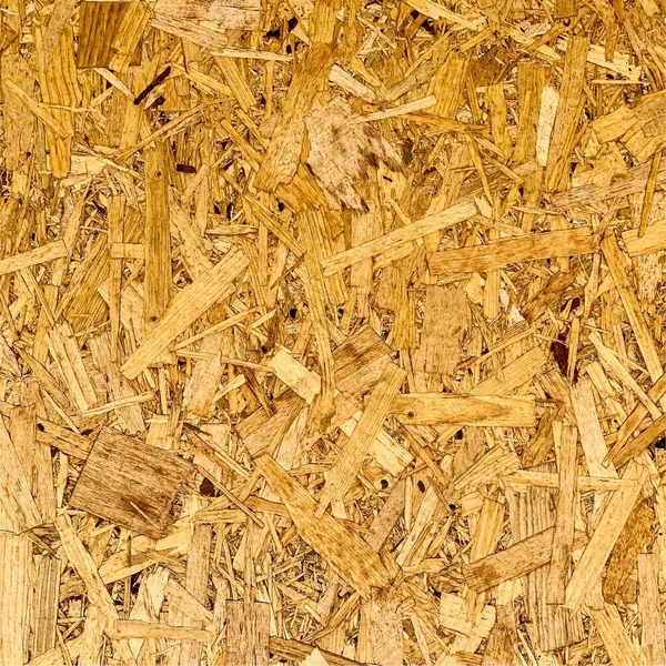 Sıkıştırılmış yonga arka planı. Ahşap zemin. OSB dokusu