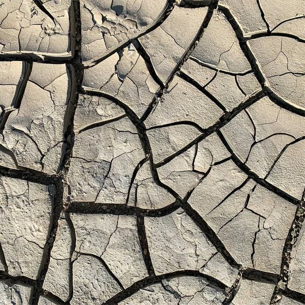 Cracked Earth Background Dry Ground Surface Cracks Mud Cracks — стоковое фото