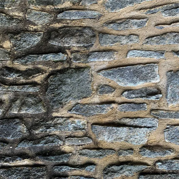 Eski taş duvar arka planı. Taş zemin