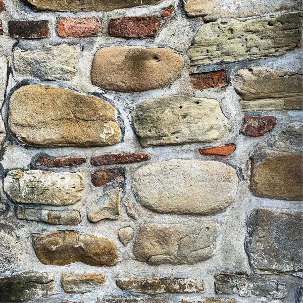 Eski taş duvar arka planı. Taş zemin