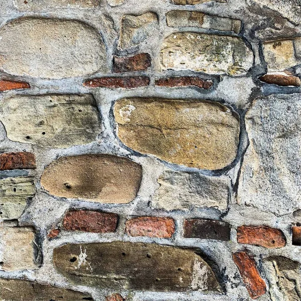 Eski taş duvar arka planı. Taş zemin