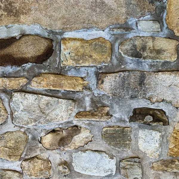 Eski taş duvar arka planı. Taş zemin