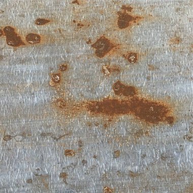 Paslı metal yüzey dokusu. Paslı Arkaplan