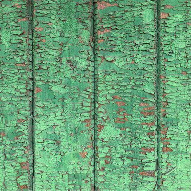 Yıpranmış boya desenli ahşap bir duvar.