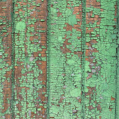 Yıpranmış boya desenli ahşap bir duvar.