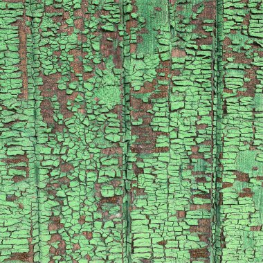 Yıpranmış boya desenli ahşap bir duvar.