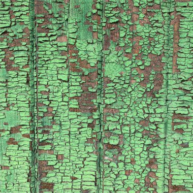 Yıpranmış boya desenli ahşap bir duvar.