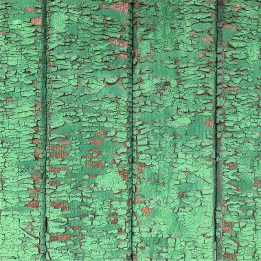 Yıpranmış boya desenli ahşap bir duvar.