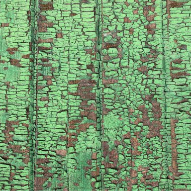 Yıpranmış boya desenli ahşap bir duvar.