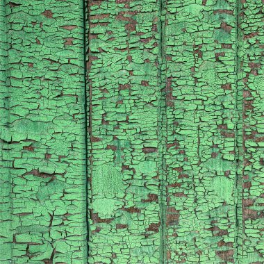 Yıpranmış boya desenli ahşap bir duvar.