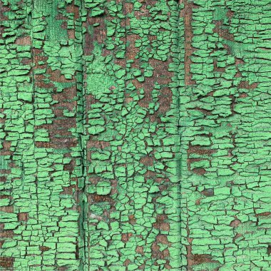 Yıpranmış boya desenli ahşap bir duvar.