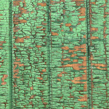 Yıpranmış boya desenli ahşap bir duvar.