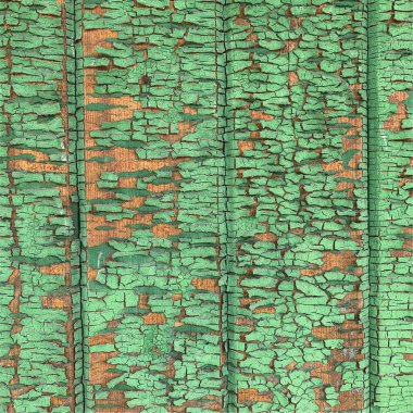 Yıpranmış boya desenli ahşap bir duvar.