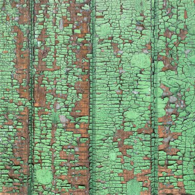 Yıpranmış boya desenli ahşap bir duvar.