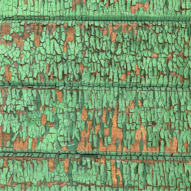 Yıpranmış boya desenli ahşap bir duvar.