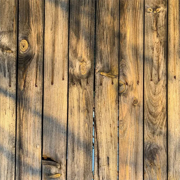 Ahşap duvar arka planı. Çit arkaplanı. Tahtadan yapılmış kalas.