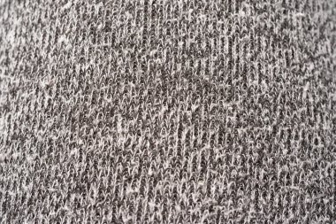 Yünlü kumaş dokusunun ayrıntıları. Kumaş grisi arka plan. Gri heather kumaşı