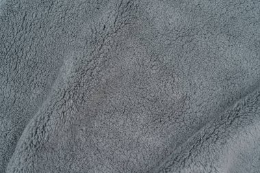 Yumuşak gri ekose desenli, gri tüylü. Sıcaklık ve rahatlık arka plan, yumuşak dokunuş. Sıcak malzeme. Samimi yün deseni