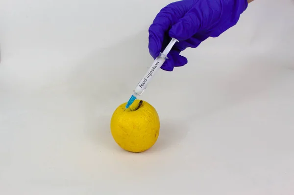 Hand Syringe Injecting Yellow Apple Close Isolated White — Stock Photo, Image