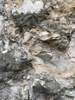 Granit taş duvarın bulanık arkaplanı, taş dokusunu kapat