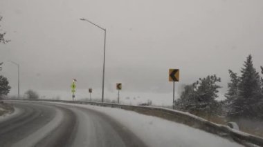 Colorado, USA - Snow Storm Blizzard Covered The Road with Ice during Winter Frozen