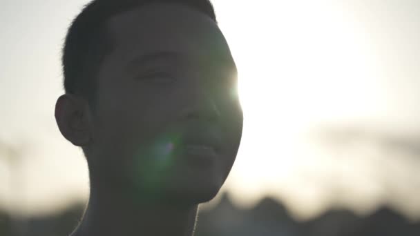 Portrait Asian Indonesian Male Hopeful Thoughtful Confident Face Illuminated Sun — Stock video