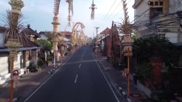 Bali Indonesia Aerial Drone Street Kerobokan Decorated Penjors Decorative Bamboo — стокове відео