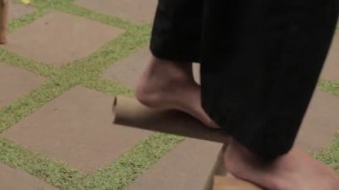 Egrang, A Traditional Game from Indonesia Using Pair of Bamboo to Conquer Balance Steps Played by Indonesian Boys