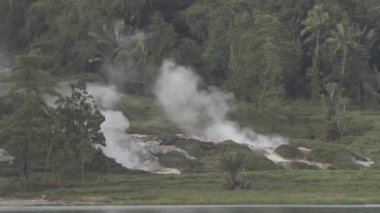 Volcanic Lake Linow Tomohon, North Sulawesi, Indonesia - Green Water, Bubbling Mud Pools and Steam