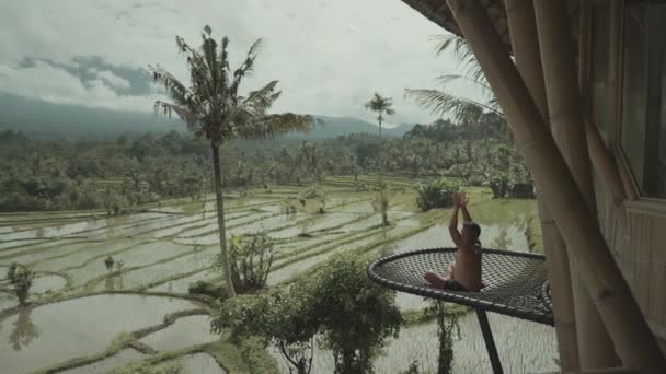 Man Healing Yoga Meditation Facing Mountain Green Rice Field Slow — Vídeos de Stock