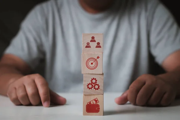 Business Man Analyzes Business Strategy Wooden Cube Block Concept Developing — Stockfoto