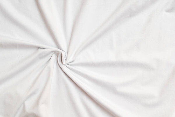 Closeup rippled soft white fabric texture background
