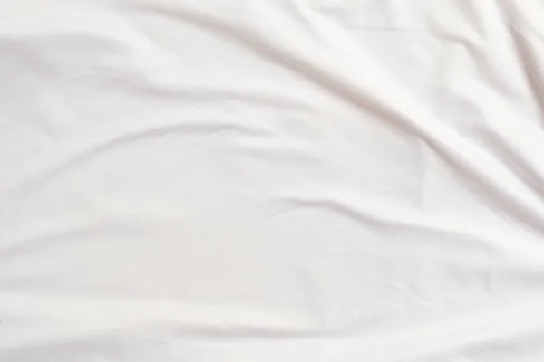Closeup rippled soft white fabric texture background