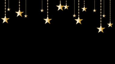 Noel balolarının içinde altın yıldızlarla birlikte asılı duran 