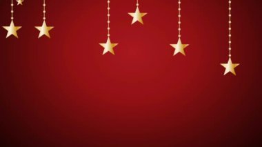 Noel balolarının içinde altın yıldızlarla birlikte asılı duran 