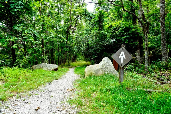 Appalachian Trail sign along the Blue Ridge Parkway in Virginia. The Great Valley Overlook, Milepost 99.6 of the Parkway. The Appalachian Trail is a long distance trail runs along Blue Ridge Parkway.