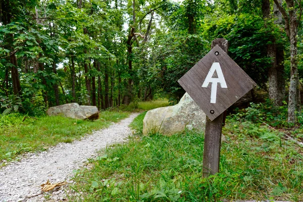 Appalachian Trail sign along the Blue Ridge Parkway in Virginia. The Great Valley Overlook, Milepost 99.6 of the Parkway. The Appalachian Trail is a long distance trail runs along Blue Ridge Parkway.