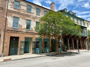 Charleston, South Carolina, USA: Dock Street Theatre in the historic downtown French Quarter. Brick with wrought iron balcony and sandstone columns. Americas first theater.