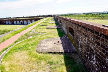 Savannah, Georgia: Fort Pulaski National Monument. American Civil War fort, Confederate Army surrendered fort to Union after rifled cannon siege. The terreplein with cannon mounts and parapet.