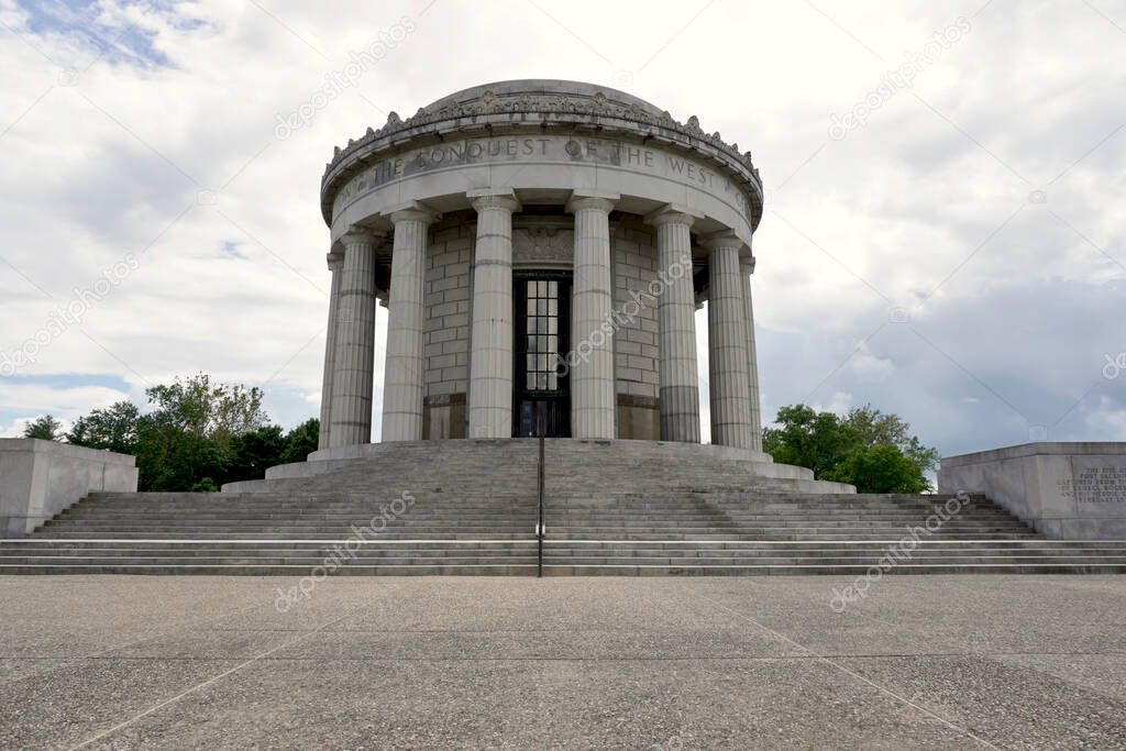 Vincennes, Indiana: George Rogers Clark National Historical Park at site of Fort Sackville American Revolutionary victory. Memorial exterior - circular granite with fluted Greek Doric columns.                                