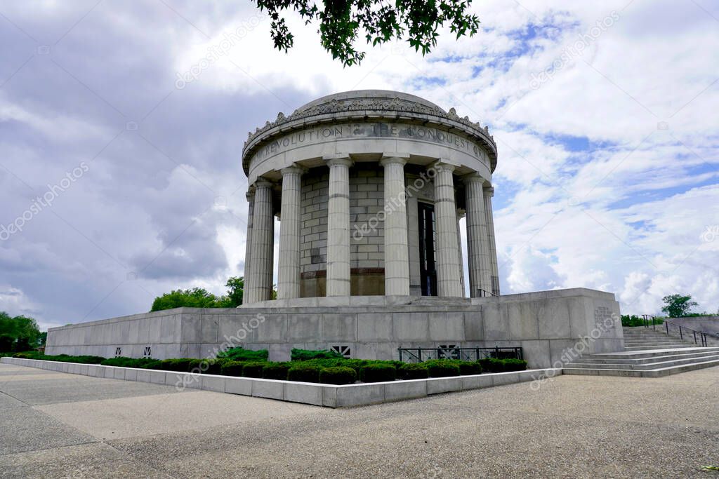 Vincennes, Indiana: George Rogers Clark National Historical Park at site of Fort Sackville American Revolutionary victory. Memorial exterior - circular granite with fluted Greek Doric columns. 