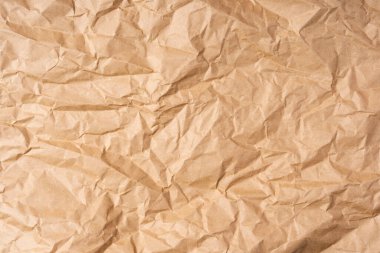 Buruşuk ambalaj kağıdı arka planı, bej kabataslak yaratıcı arkaplan, ambalaj kağıdı dokusu.