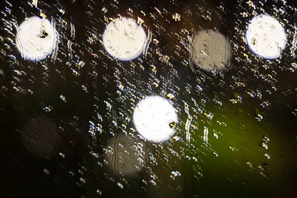 Night Unfocused View Wet Glass Raindrops Background Street Lights Blurred — Stock Photo, Image