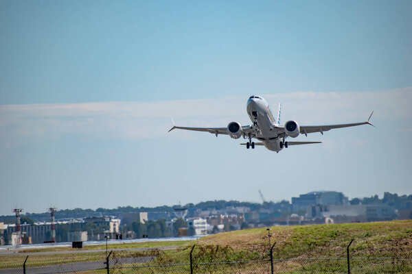 Arlington, Virginia, USA - September 29, 2021: Plane Takes Off from Ronald Reagan Washington National Airport on a Clear Day