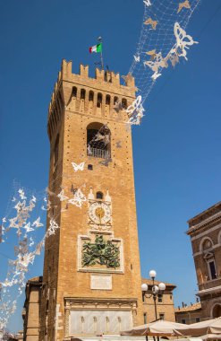 View on the tower with clock of Recanati. August 2021 Recanati, Marche - Italy clipart