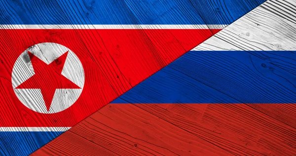 背景与国旗朝鲜和俄罗斯在分裂的木板 3D说明 — 图库照片