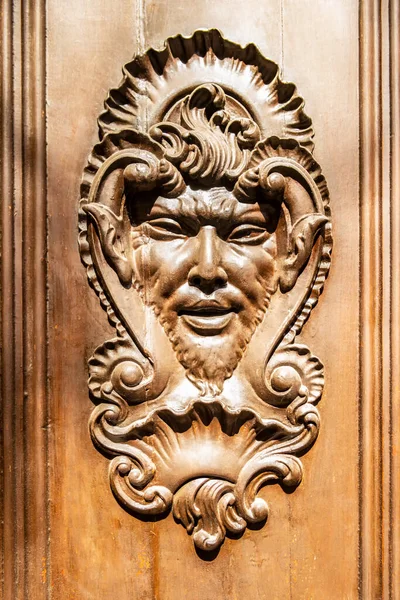 Wooden Door Engraving Mythological Face — Stock Photo, Image