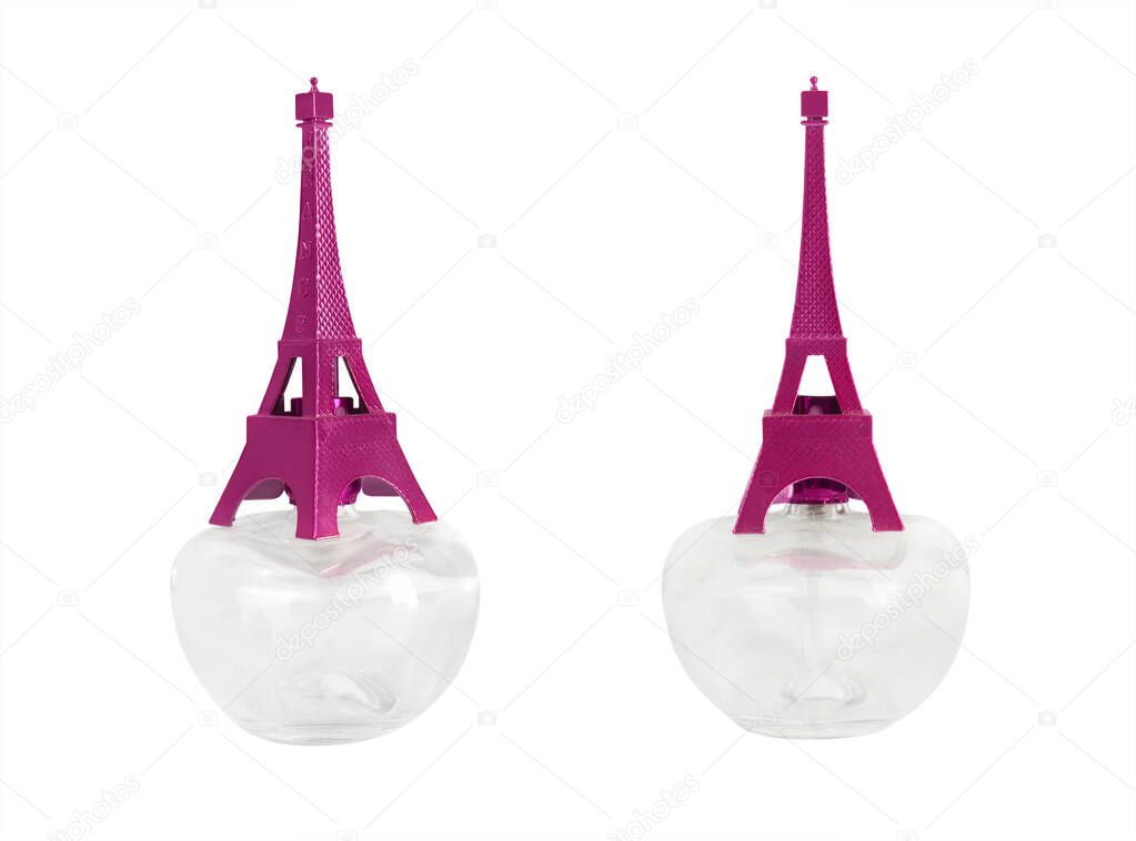 Bottle of women's perfume with a decorative Eiffel Tower at the top.