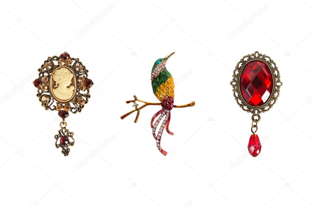 Jewelry set of 3 colorful vintage brooches - cameo, bird and victorian brooches, fashion accessories, isolated photo